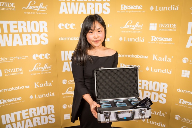 Annie Tong of The University of Auckland with her $1000 of prize money after winning the Student award at the 2018 Interior Awards night.