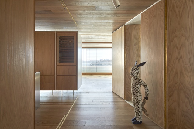 Timber is used throughout the apartment to create a feeling of warmth and intimacy.