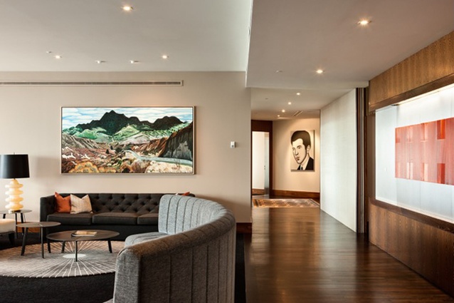 The reception at Russell McVeagh is dominated by a Dick Frizzell landscape painting. Its colours and tones serve as inspiration for the MMiD-led refit. 