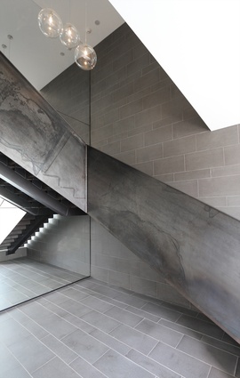 408 Anglesea Street, Hamilton. The entry foyer features a raw steel staircase.