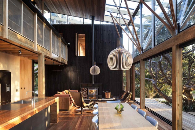 Light pours into the double height living space. 