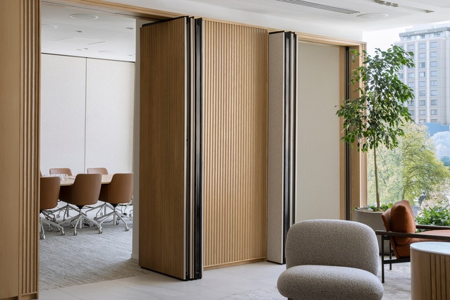 Natural lighting fills the space, in both the meeting rooms and waiting spaces.