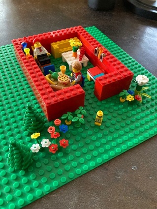 Finalist: Heather (age 7) – Heather made a home for "Hank and Wu, two lego people". 