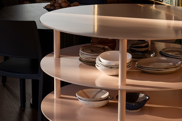 The freestanding aluminium island is a refined, yet playful, centre piece of the kitchen.