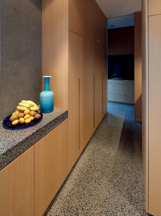 Throughout the interior, built-in cabinetry adds to a sleek, uncluttered look. 