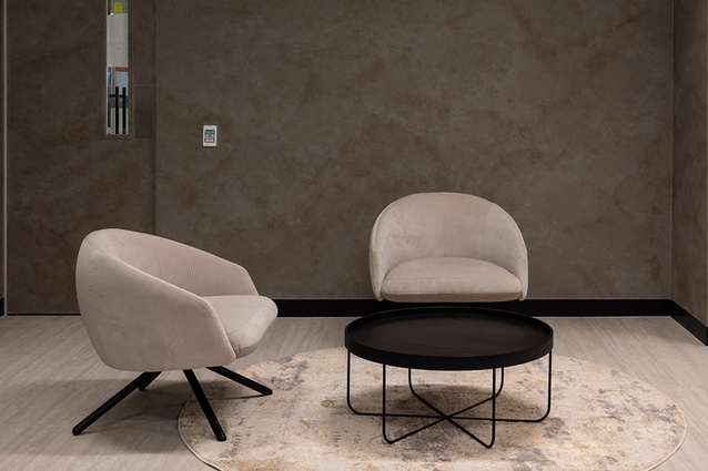 Communal areas in the 12th-floor space feature high-quality fabrics and finishes. 
