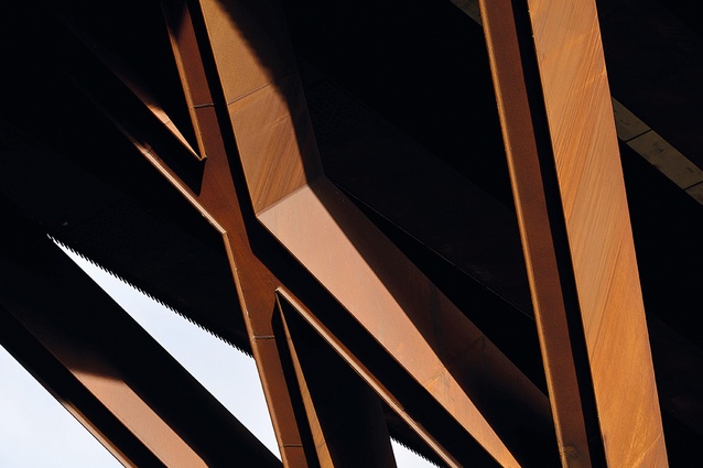 Shadow lines emphasise the laced interlock of the support pier.