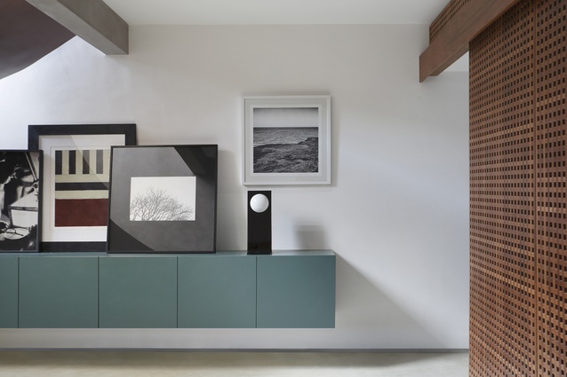 A palette of teal, warm woods, concrete and white offers a refreshing visual canvas for the sporadic blast of colours, artwork and tropical climate.