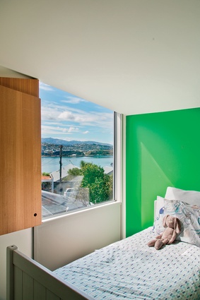 A child’s bedroom with a panoramic view. 
