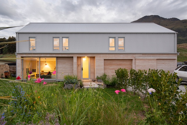Barns in rural areas of Otago provided inspiration for this family home in a close-knit suburb of Queenstown.