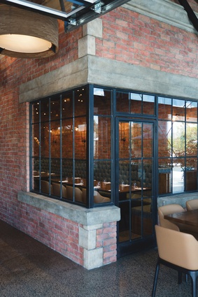 The Grounds restaurant features comfortable furniture in neutral tones.