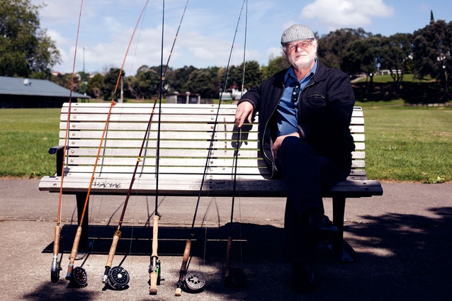 Don McKenzie with some of his collection of fly fishing rods.