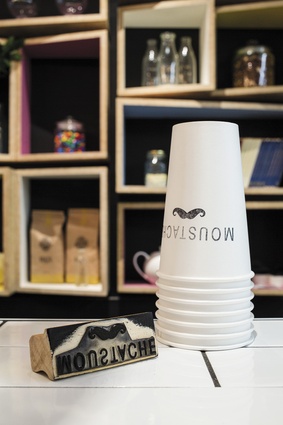 Print only what you need – the shop’s signature motif is hand-stamped onto cups and paper bags.