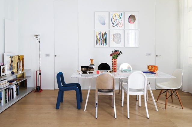 Surrounding the Bouroullecs' Baguette dining table is a mix of different chairs, including Blue Bold chair by Big-Game, an Eames' DSW and Andrée Putman's Morgans chair for Emeco.