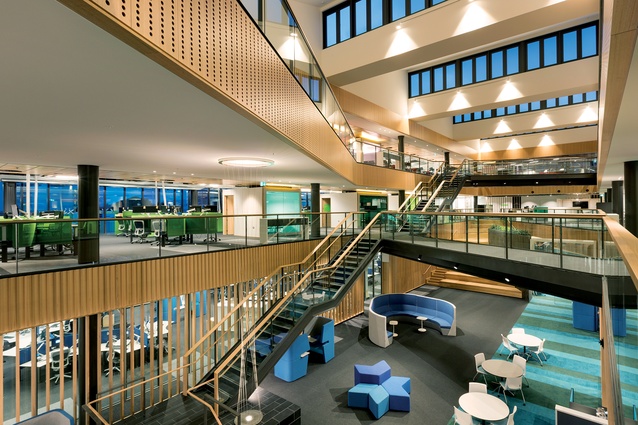 An ample atrium with a variety of bridges allows for visual and physical connections between staff. 
