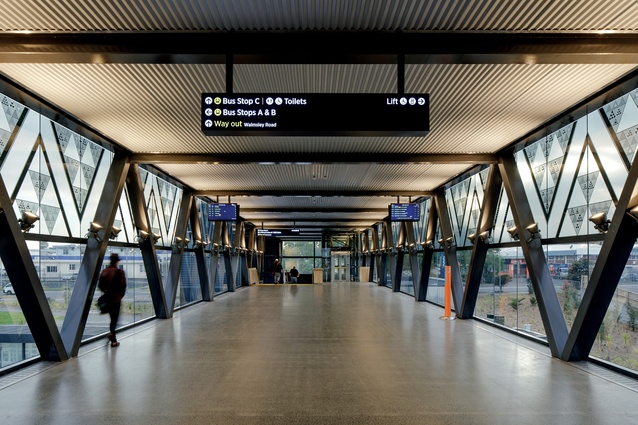 The interior of the elevated concourse. This bridge form allows clear separation of people and vehicles, and links the railway platforms with new bus platforms, all under cover. 