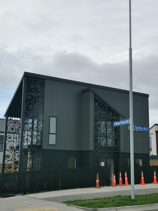 The exterior of this Hobsonville Point home represents a collaboration between Fletcher Living and Patiki Studio and Ngāti Whātua o Kaipara.