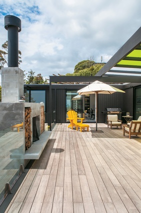 The outdoor fireplace was designed by Tim Dorrington.