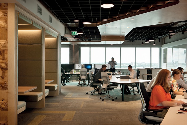 Unassigned desking allows teams to come together as required, and natural light permeates the interior.