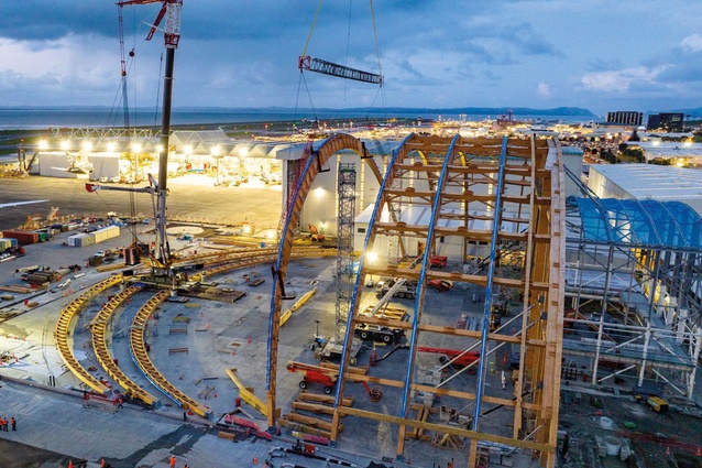 Hinging the vast, 38-tonne trusses to the ground kept them in place during lifting.