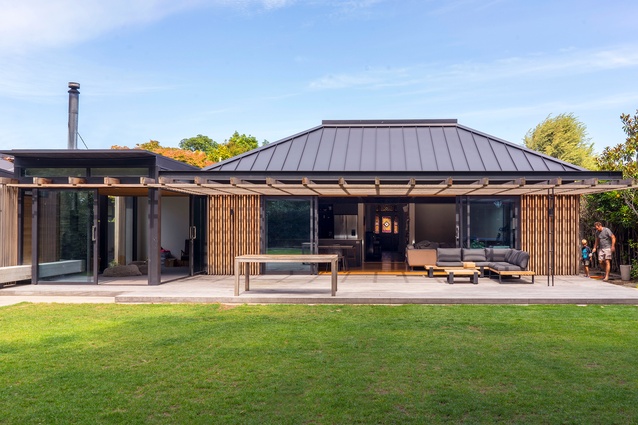 The rear elevation shows the mid-2000s’ addition to the right of the new garden room (pictured left).