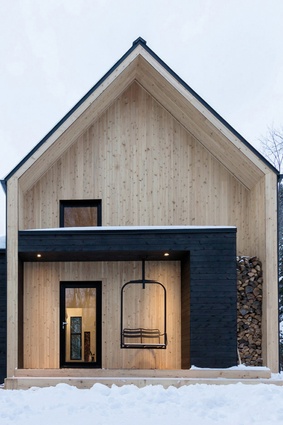 One of Zilliox’s favourite houses is Villa Boréale, a woodland cottage in Québec, Canada, designed by Cargo Architecture. It has a swing seat and a wood store built into its entrance.