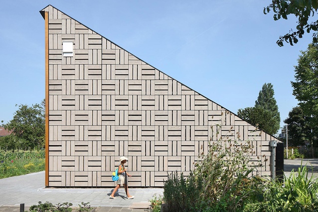 Nature & Environment Learning Center, Netherlands by Bureau SLA. The building features a passive solar heating and cooling system that is known as a Trombe wall.