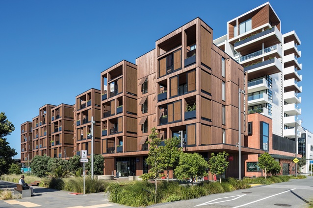 The cedar-clad 'pavilion' apartments engage with Daldy Street Park, the hubbub of the street and the retail activity below via generous semi-enclosed outside rooms cantilevering over the footpath.