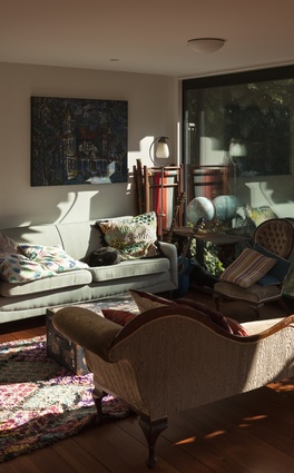 The furniture is an eclectic but curated mixture of old and new pieces, adding character to the spaces. 