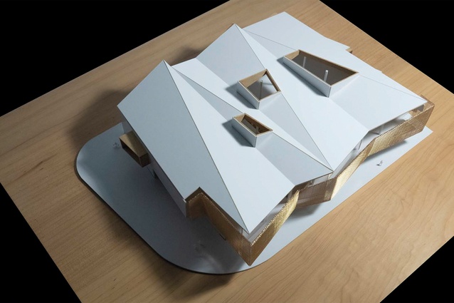 Physical design model with the faceting screen extending to the roof shaping.
