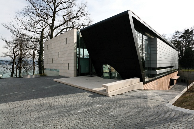 A contemporary residence and office on Lake Geneva, Switzerland, designed by Antoni.