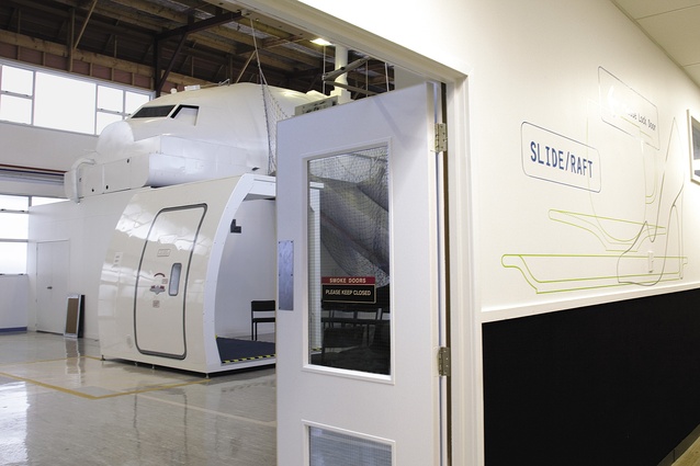 Circulation areas and a glimpse at a large 
inhouse training tool – a flight simulators, one of eight at the complex.
