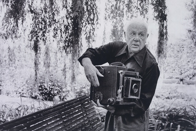 Paul Strand photographing the Orgeval Garden, 1974. Photographed by Martine Franck.
