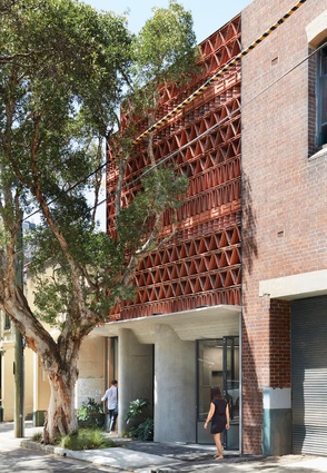 Lead designer Raffaello Rosselli’s interest in recycling materials “from the start, rather than as an afterthought” finds expression in the building’s distinctive shimmering facade. The tiles also function to mitigate the effects of the sun on the building’s western elevation.