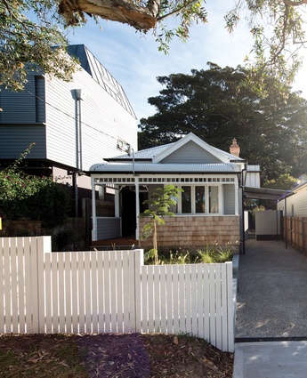 Externally, the weatherboard cottage has been restored to near-original condition.

