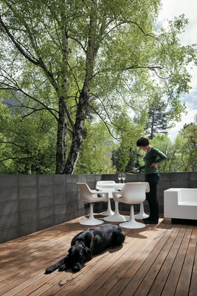 Black house, Queenstown. The boxy furniture on the deck is designed by Stacey Farrell.