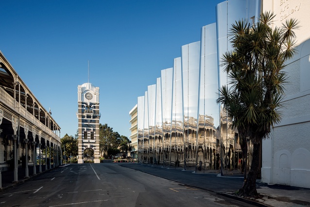 Looking up Queen Street towards the Clock Tower, with the White Hart Hotel on the left, and, on the right, the Len Lye Centre connects to the Govett-Brewster Art Gallery.