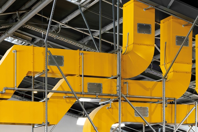 Carefully sculpted services play Tetris in the ceiling spaces, adding a touch of colour and playfulness.