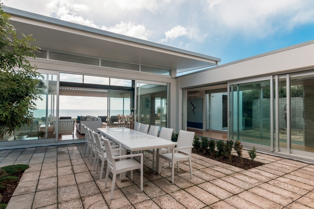 The enclosed courtyard allows for sheltered dining but still with access to the view.
