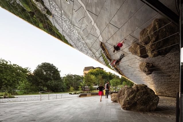 Boulders from the Port Hills, dislodged during the 2011 earthquakes, are reflected in the sloping, polished-steel soffit adjacent to the main entrance.