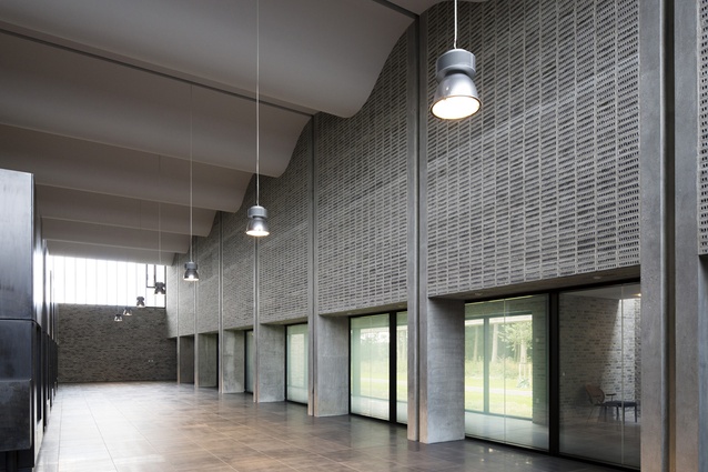 Communal crematorium, Denmark, by Henning Larsen Architects. Completed in 2013, the undulating ceiling and large windows of the interior create a warm but solemn atmosphere.