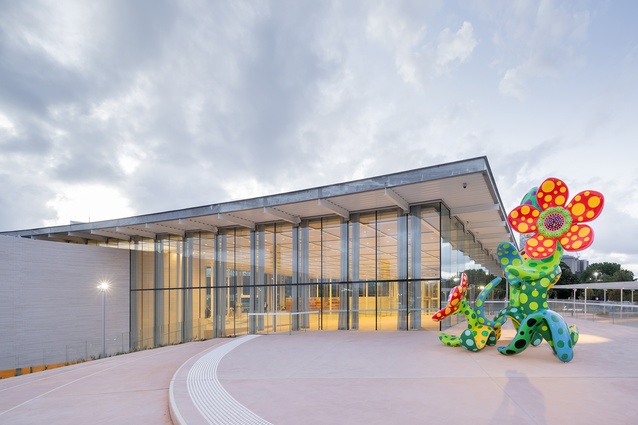Exterior view of the Welcome Plaza of the Art Gallery of New South Wales’ new building, featuring Yayoi Kusama’s <em>Flowers that Bloom in the Cosmos</em>, 2022.