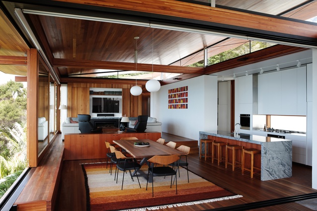 Timber sunscreens filter sunlight that enters high-level clerestory windows and flows into the interior spaces.