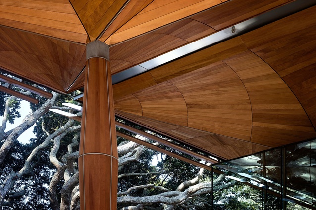 The roof balances lightly on finely tapering timber and steel posts.