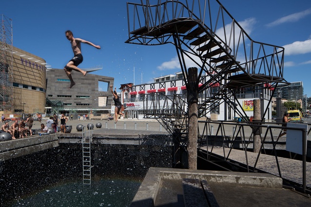 Synchronised leaping – off the high board 
and low board on Taranaki Wharf.