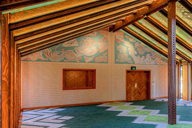 The front interior wall of the wharenui showing the digital weaving and embroidery at the top and hand-sewn patterning of the tukutuku walls at bottom.