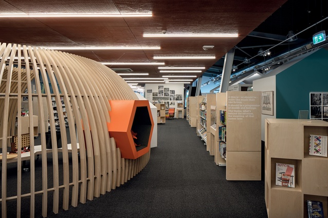 Timber ‘ribs’ form a children’s reading pod in the library space.