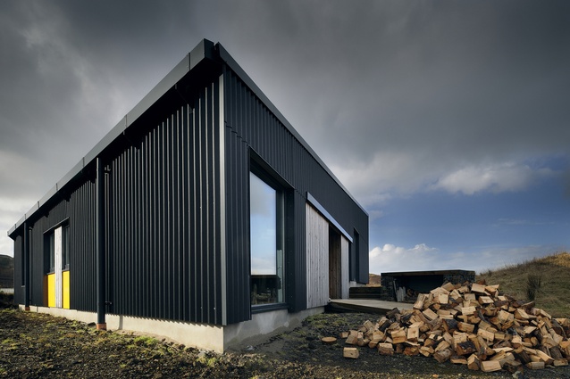Black House, Highland, United Kingdom, by Rural Design Architects. 2013. The black corrugated cladding strongly identifies with the agricultural vernacular.