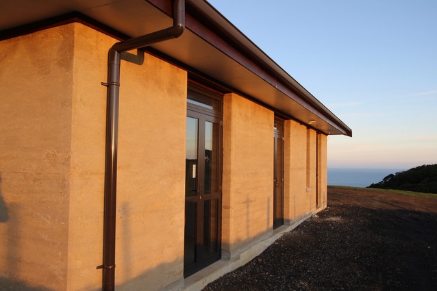 A freshly built rammed-earth home on the coast at Piha, west of Auckland.