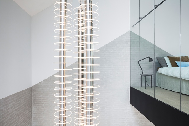 The custom pendant light was designed by Studio David Thulstrup and produced by <a 
href="http://www.northern-lights.co.uk/"style="color:#3386FF"target="_blank"><u>Northern Lights</u></a> in London. The lamp visually connects all levels of this home.